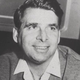 A black-and-white shot of Star Trek creator Gene Roddenberry.